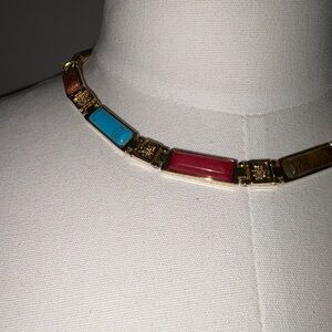 Vibrant Gold Necklace with Red, Blue, and Orange Accents